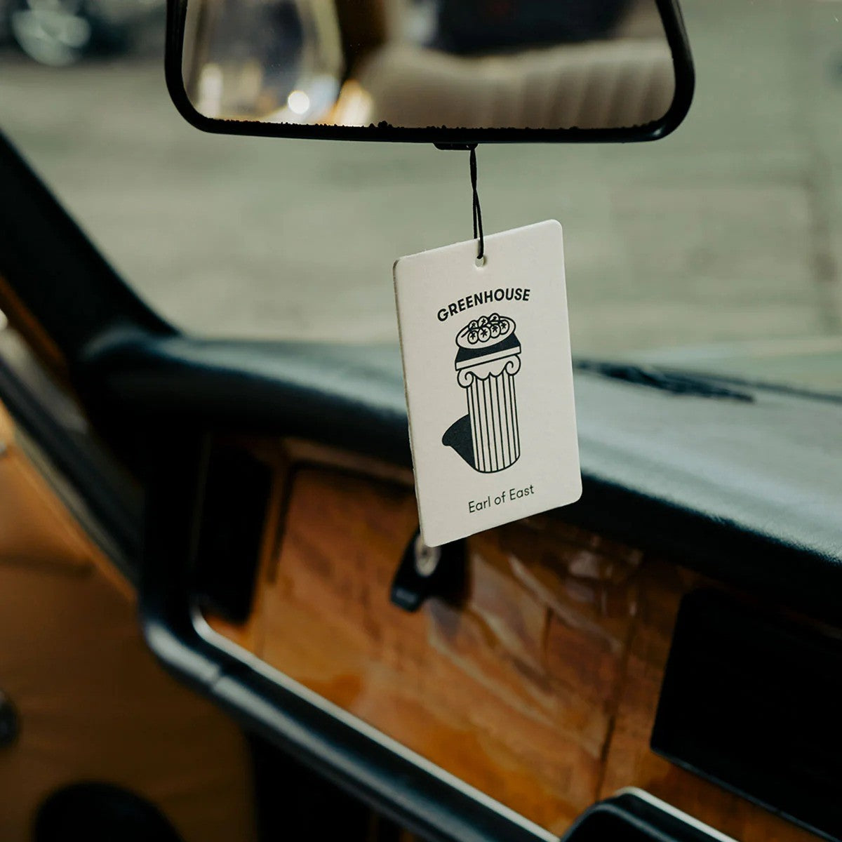 Earl of East Home & Car Card Air Freshener in Greenhouse scent, combining the fresh, earthy aromas of vine tomato, parsley seed, and basil for a revitalizing fragrance.